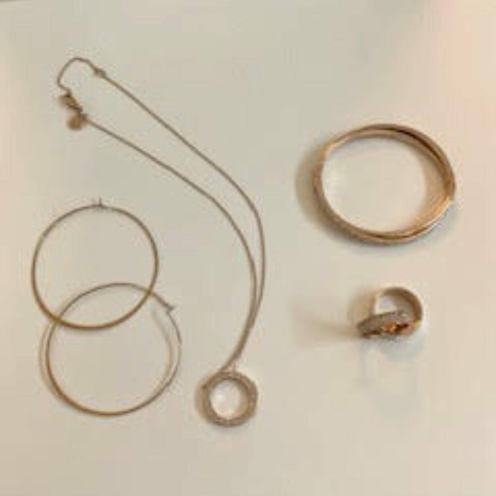 Michaels Kors rose gold tone jewelry  set